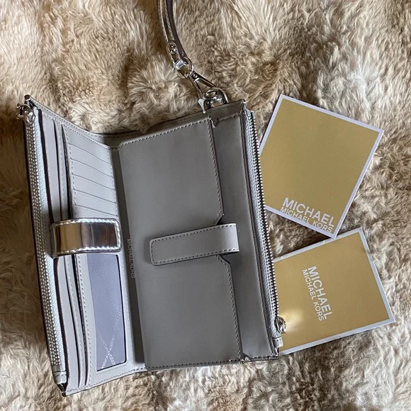 Michael Kors Metallic Silver MK Embossed Wristlet - Picture 4 of 6